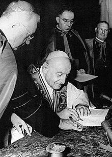 220px Ioannes XXIII Signing Of Pacem In Terris 1963